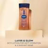 imageVaseline Glazed and Glisten Sunlit Glow Body Gel Oil Vanilla Cocoa Shimmering with UltraHydrating Lipids and 100 Pure Cocoa Butter 68 Oz